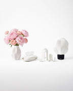 AMINI STRIA Complete Set in White — all four pieces with pink peonies in the vase, pure white background