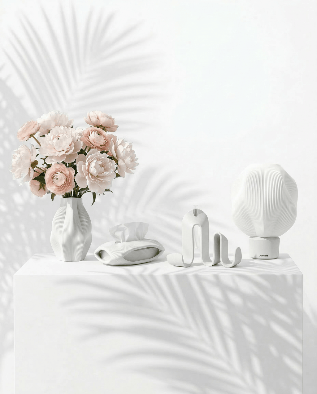 AMINI STRIA Complete Set in White — all four pieces on a draped table with palm shadows and pink peonies in the vase