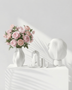 AMINI STRIA Core Set in White — vase, lamp and book holder on a white pedestal with pink peonies