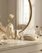 AMINI STRIA Entry Set in Cream — book holder with single peach rose in glass tube and tissue holder on a cream vanity with round gold mirror