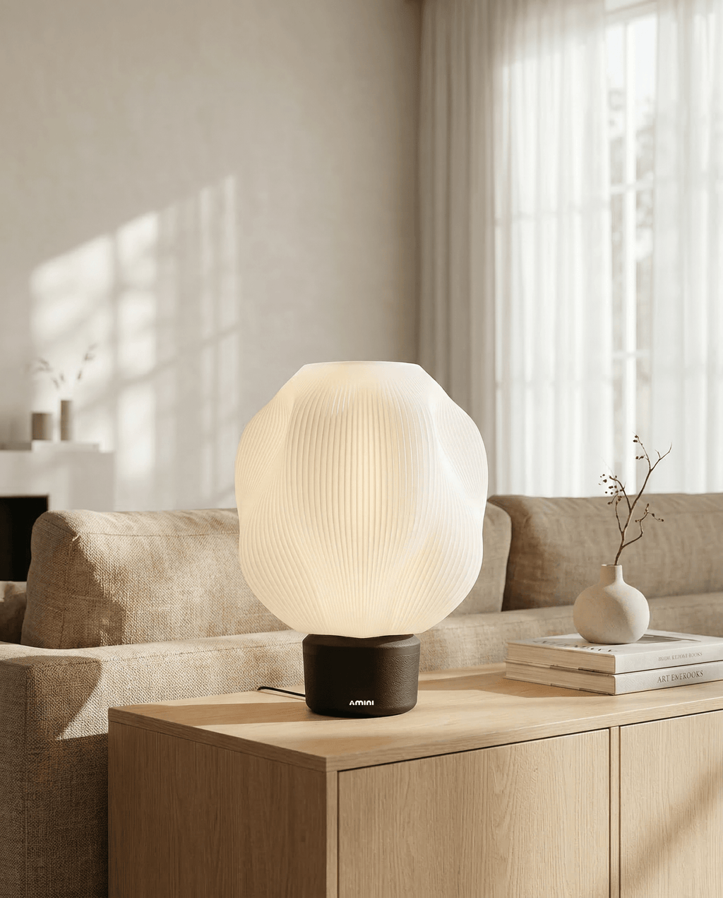 AMINI STRIA Lamp in Charcoal — lit on a wooden sideboard in a warm living room