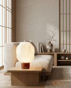 AMINI STRIA Lamp in Terracotta — on a low coffee table in a Japanese-inspired room with shoji screens and natural decor