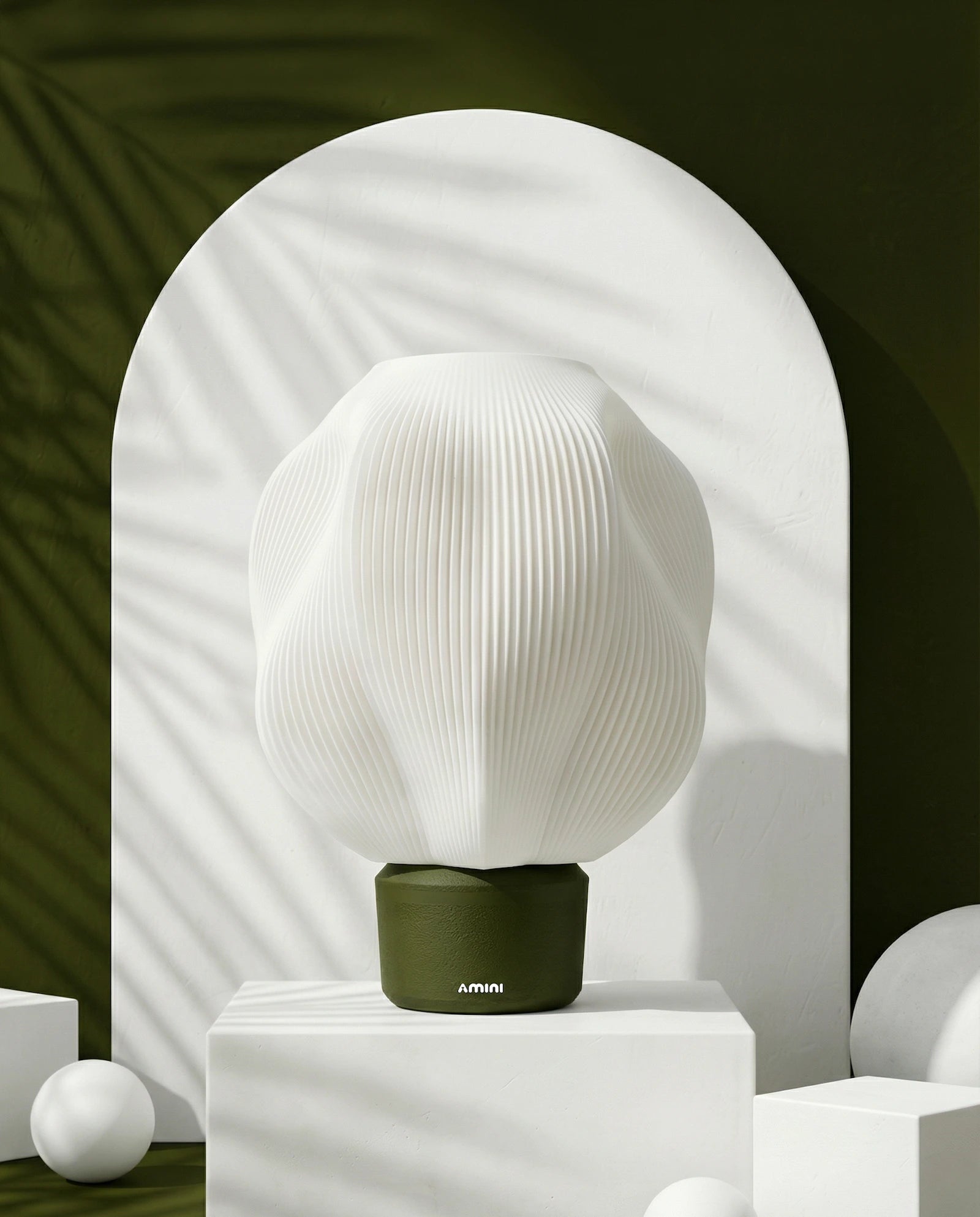 STRIA sculptural table lamp in olive with ribbed texture – AMINI