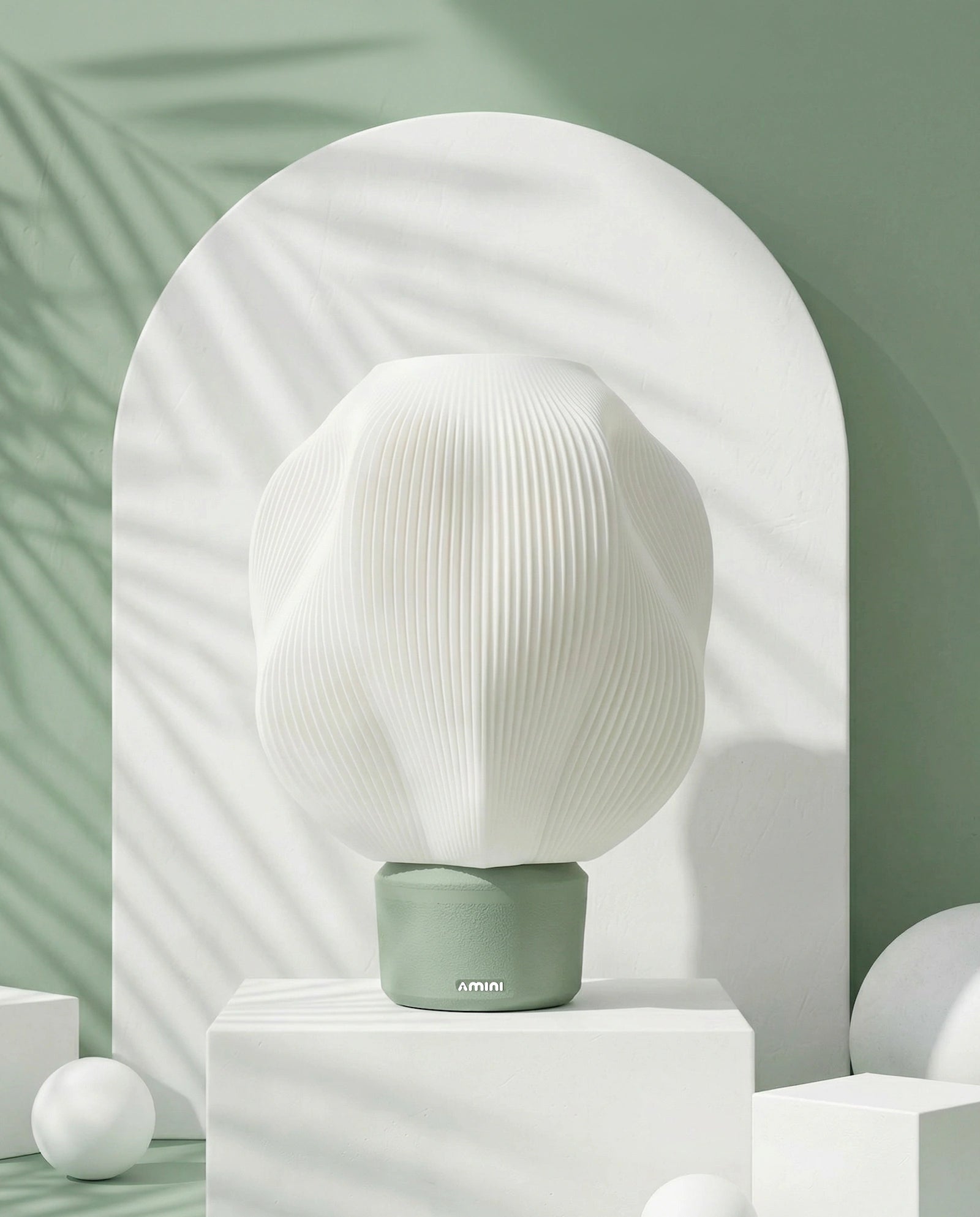 STRIA sculptural table lamp in pistachio with ribbed texture – AMINI