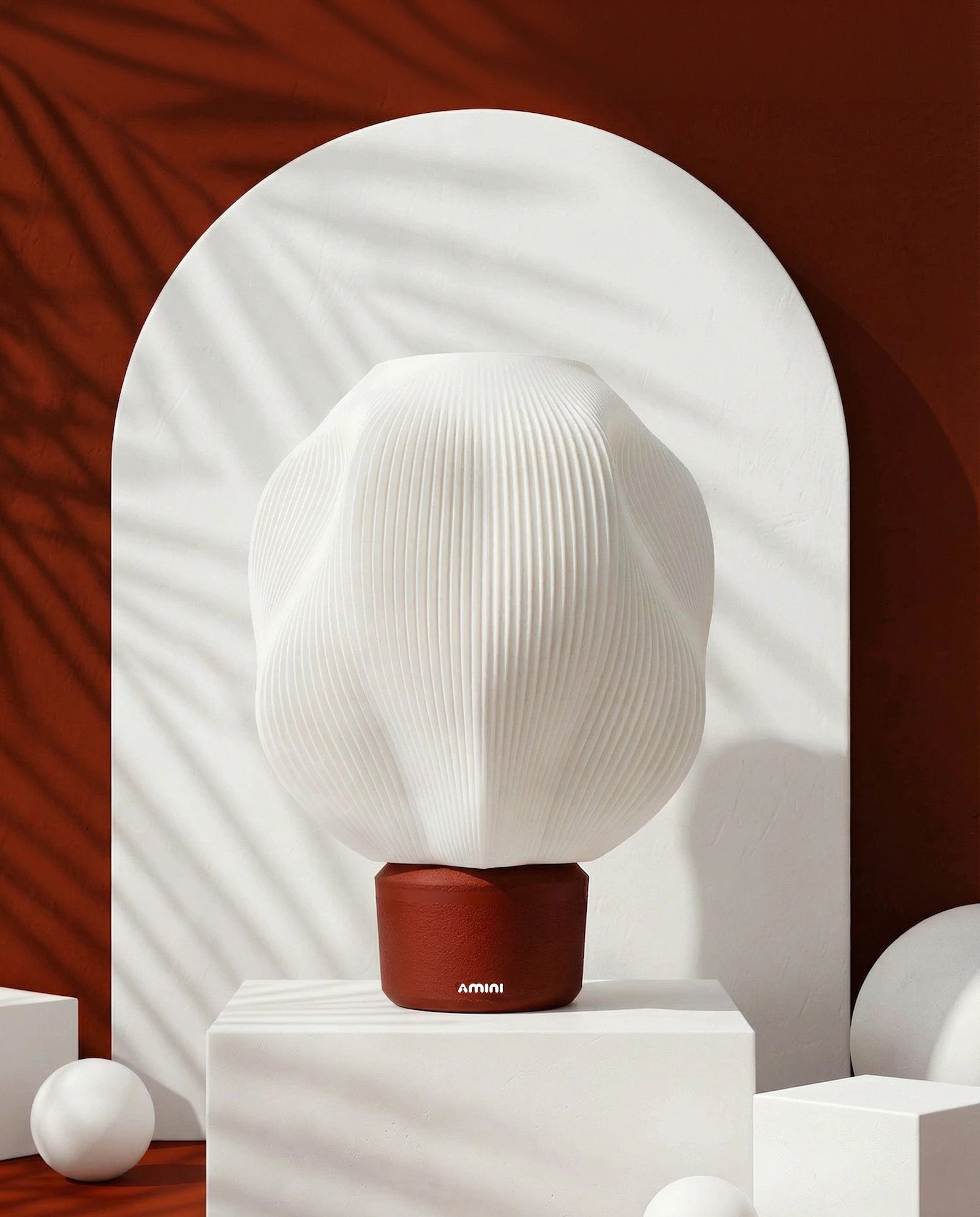 STRIA sculptural table lamp in terracotta with ribbed texture – AMINI