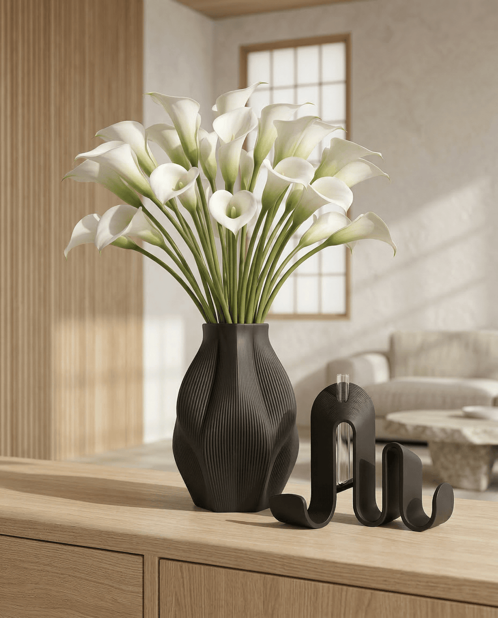 AMINI STRIA Living Set in Charcoal — vase with white calla lilies beside book holder on a light oak sideboard in a Japanese-style room