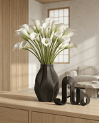 AMINI STRIA Living Set in Charcoal — vase with white calla lilies beside book holder on a light oak sideboard in a Japanese-style room