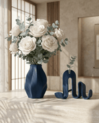 AMINI STRIA Living Set in Navy — vase with white roses and eucalyptus beside book holder on a travertine surface in a Japanese-style interior