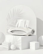 AMINI STRIA Tissue Holder in White — studio shot with arch backdrop and white cubes