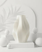 AMINI STRIA Vase in White — studio shot with arch backdrop and white spheres